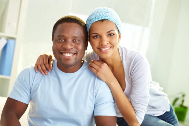 black man and woman smiling